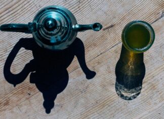 Daily flavonoid-rich food intake may lower dementia risk by 28% pot and cup of green tea seen from above