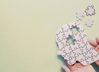 Five essential habits for maintaining cognitive health as you age A puzzle featuring the outline of a human head with one piece missing