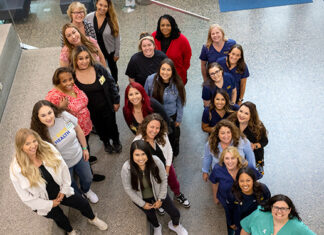 Volunteer doula applications now being accepted 22 volunteer doulas stand on three different steps.