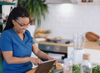 High-quality carbohydrate consumption boosts healthy aging in women, 32-year study finds Image of Nurse getting ready for her job in the morning.