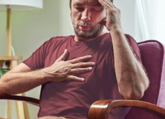 What’s Causing that Fluttering in Your Chest? man experiencing fluttering/pain in chest